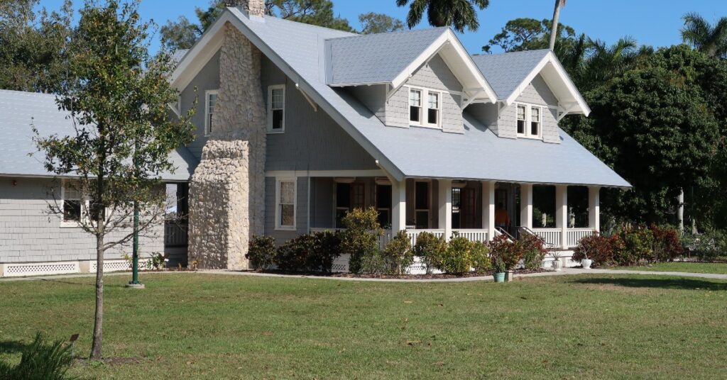 beautiful landscaping in front lawn of home