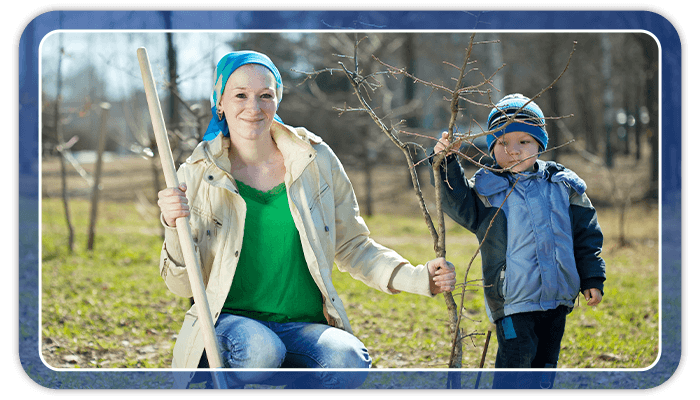 Image of a mother and son doing yard work